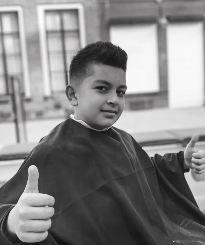 Jongens knipbeurt bij barbershop Nehme Kampen
